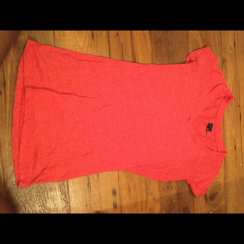 Pink workout shirt.